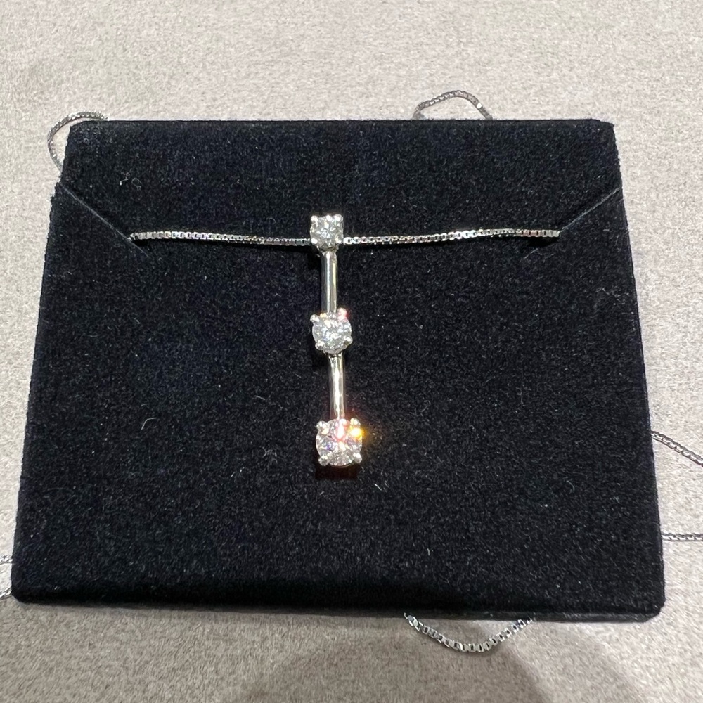 3 stone Debeers necklace 1/2 carat total weight
